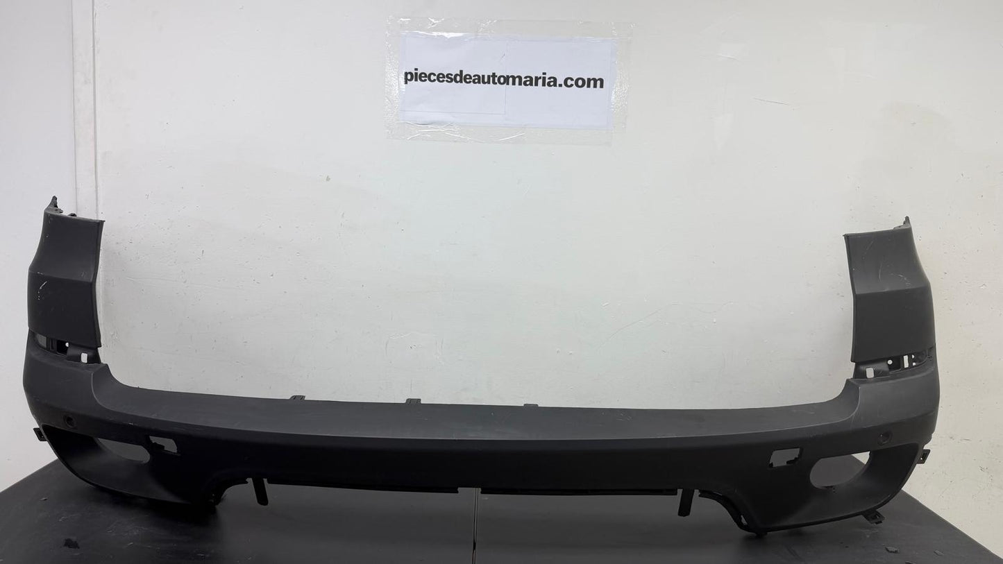 BMW X5 2011-2013 Rear bumper cover | E70; 3.0L; w/o M Pkg; w/Park Distance Control