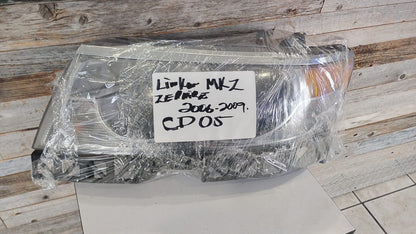 LINCOLN MKZ ZEPHYR 06-09  LEFT DRIVER SIDE HEADLIGHT HALOGEN HEAD LIGHT OEM