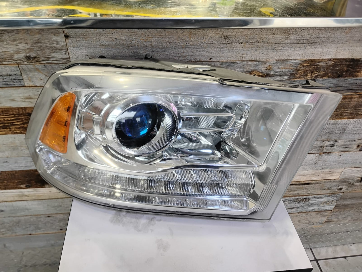 DODGE RAM HEADLAMP 2016 - 2018  PASSAGER SIDE ,CHROME BEZEL