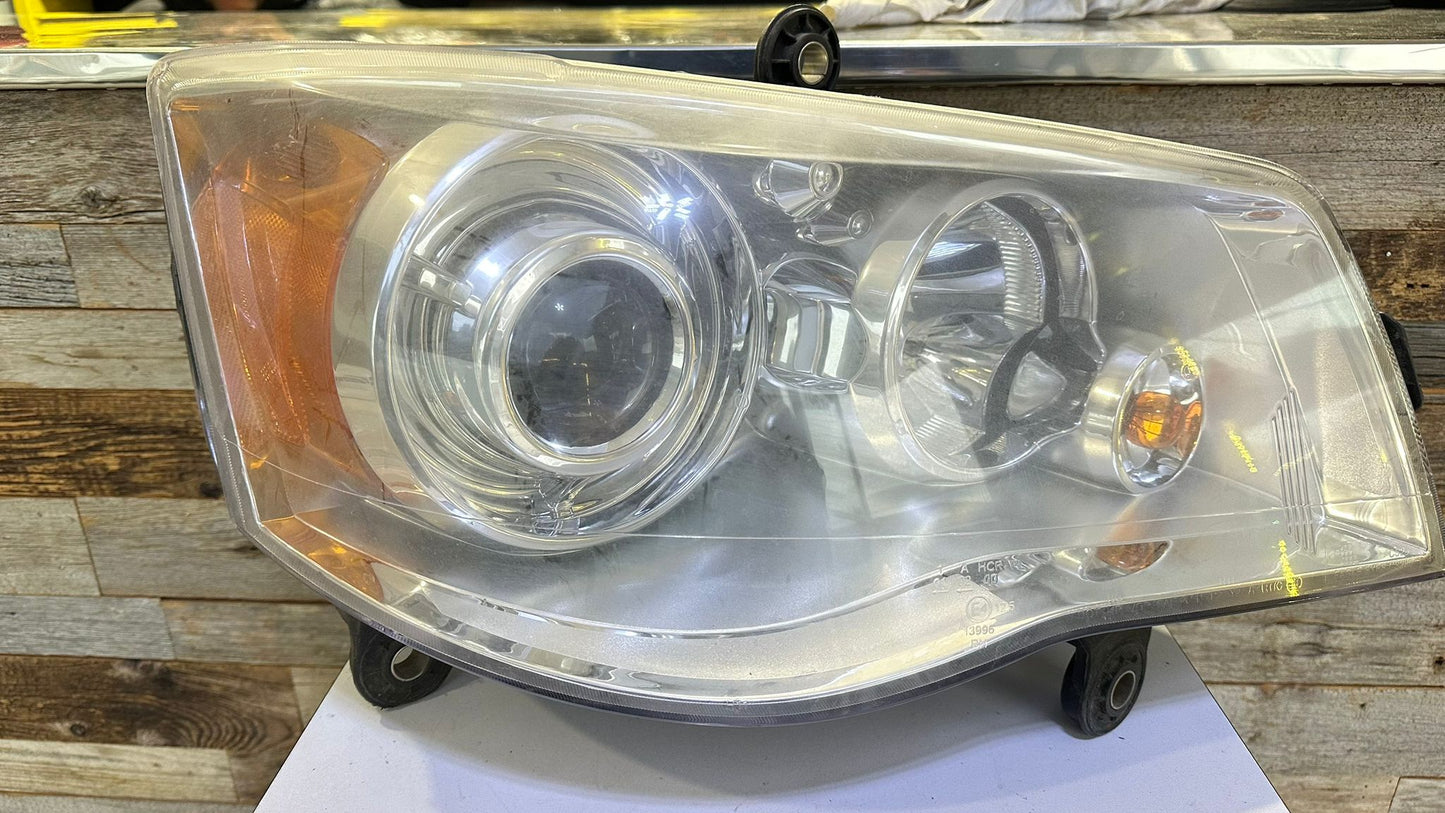CHRYSLER TOWN & COUNTRY 2008 2016 Passenger Headlamp lens/housing HID; North America Spec (Code LMP)