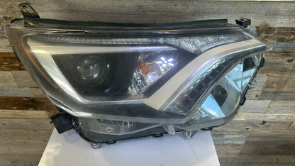 TOYOTA RAV4 2016-2018 Passenger  Headlamp assy composite Halogen; North America Built; w/Black Bezel
