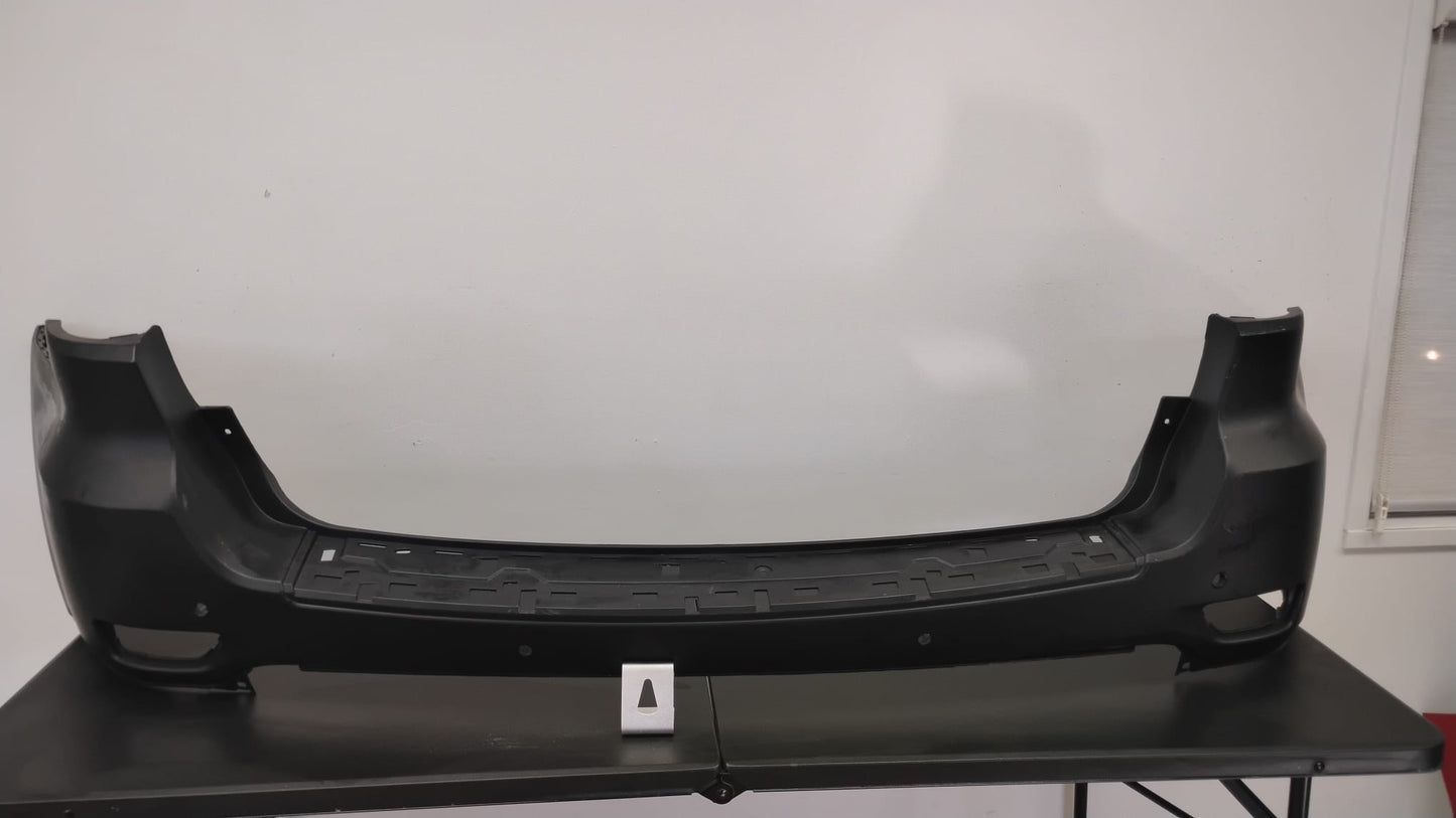JEEP GRAND CHEROKEE 2011-2015 Rear bumper cover w/Parking Sensor; w/o Blind Spot Detection; w/o Chrome Trim; prime