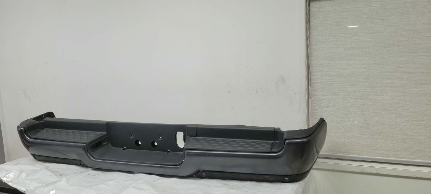 DODGE RAM 1500 SILVER GREY 2019 -2022 Rear bumper assembly Exc REBEL; Single Exh; w/Adv Park; w/Parking Sensor; see notes; prime