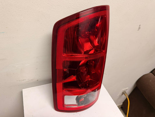 DODGE RAM 1500| 2002-2006 Driver Taillamp assy R1500 MEGA CAB; w/o bulbs or sockets