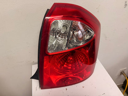 KIA SPECTRA 2004-2006 Passenger Taillamp assy 4dr sedan; new design