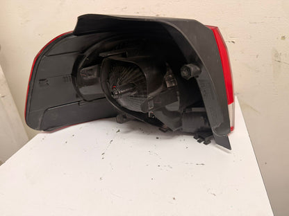 VOLKSWAGEN GOLF/GTI 2010-2014 Passenger Taillamp assy outer w/o LED Lamps; Hella Brand; Lens/Housing Only