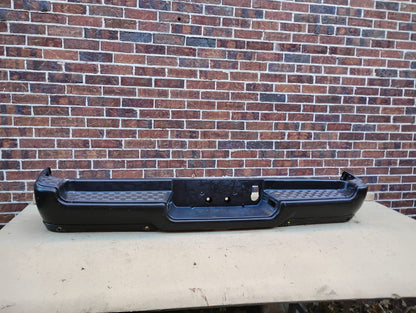 DODGE RAM 1500 2019 2022 Rear bumper assembly Exc REBEL; Single Exh; w/Adv Park; w/Parking Sensor; see notes; prime
